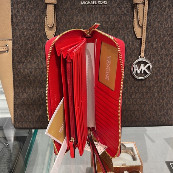 MICHAEL KORS Leather Continental Phone Holder Wristlet Wallet 
Dark Sungria
NWT